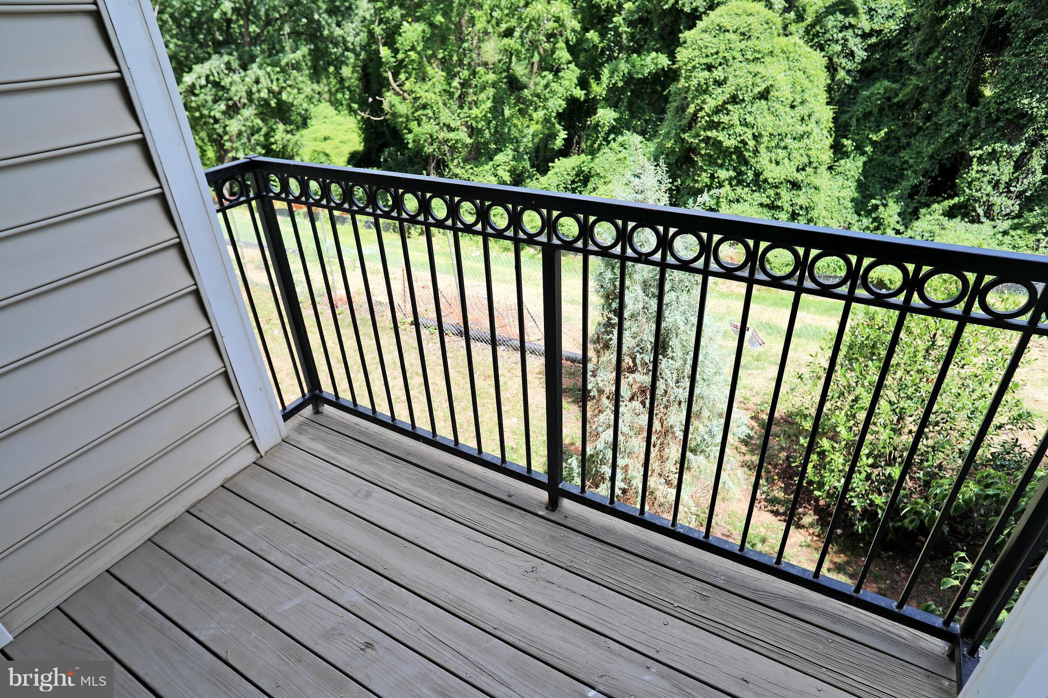 1601 Spring Gate Dr., Unit 1202 McLean, VA 22102 - Photo 9 of 30 a view of balcony with wooden floor
