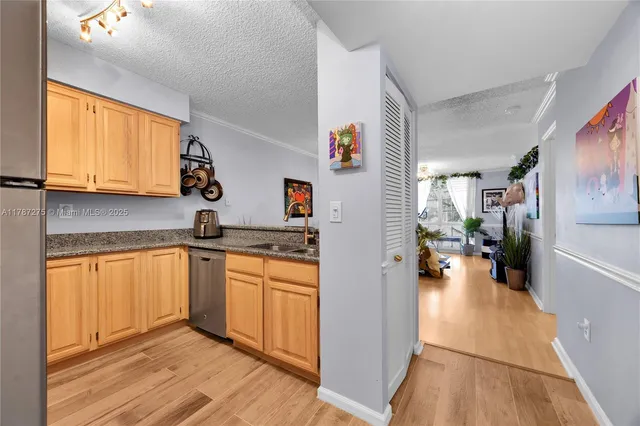 a view of a kitchen from the kitchen