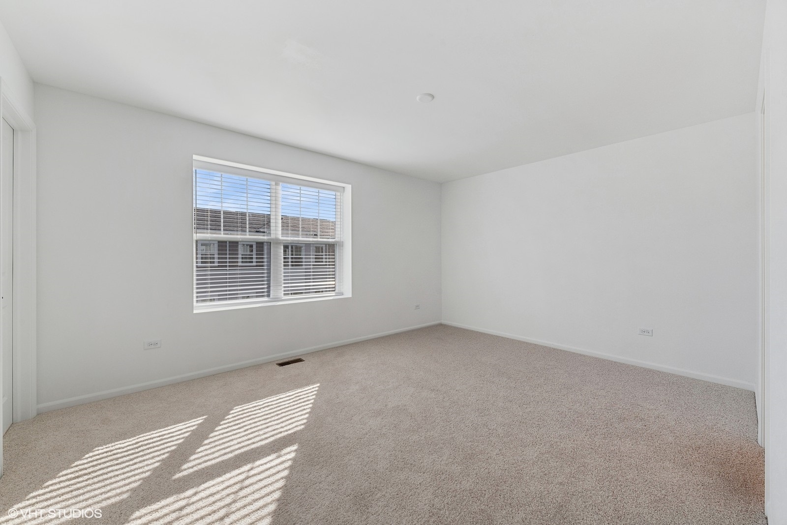 1033 Wren Road Des Plaines, IL 60018 - Photo 11 of 20 a view of an empty room with a window