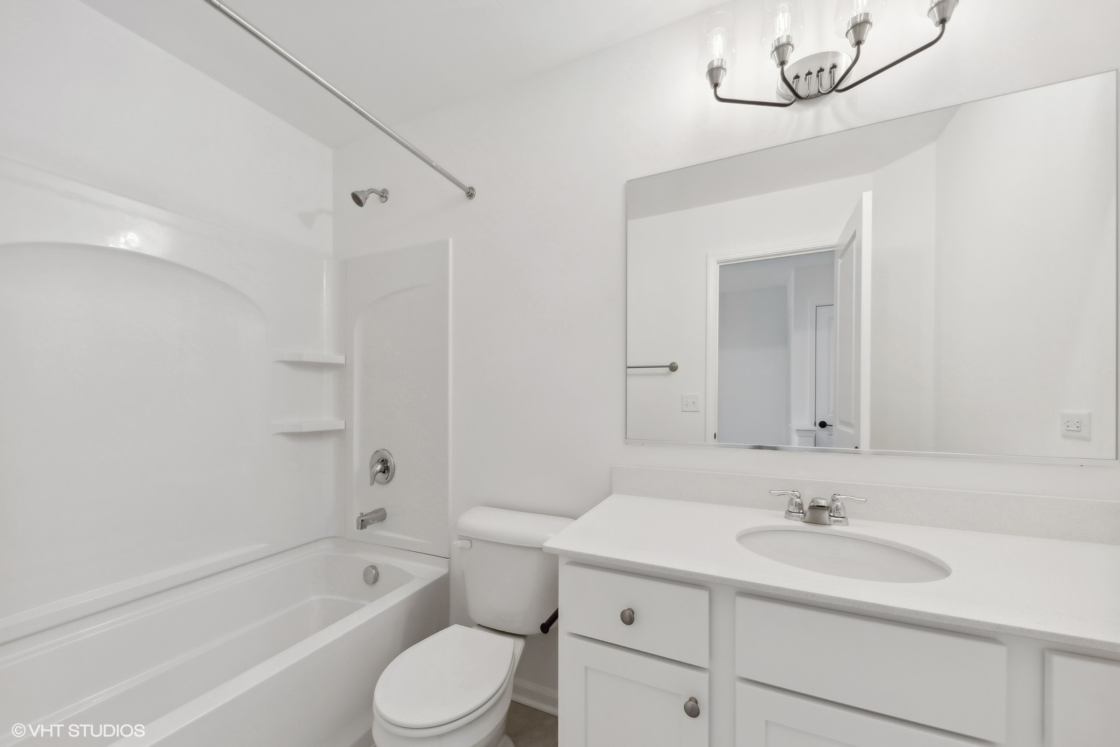 1033 Wren Road Des Plaines, IL 60018 - Photo 16 of 20 a bathroom with a sink a toilet and a bathtub