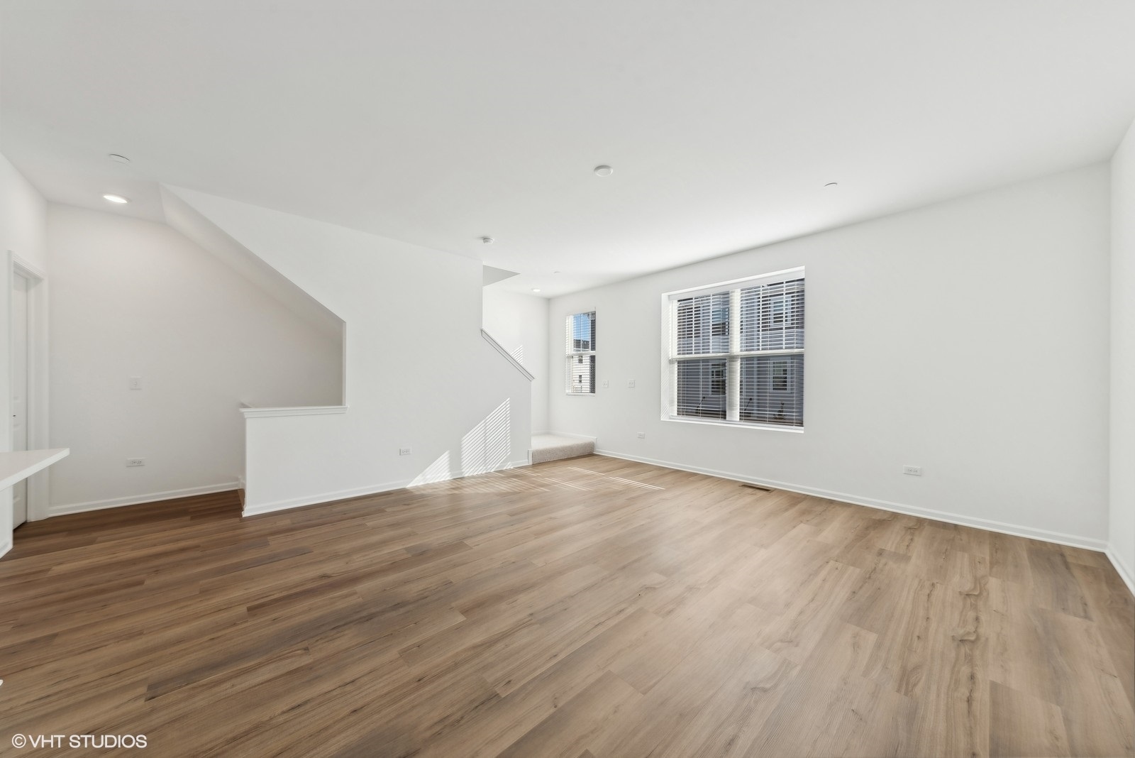 1033 Wren Road Des Plaines, IL 60018 - Photo 2 of 20 a view of empty room with wooden floor and fan