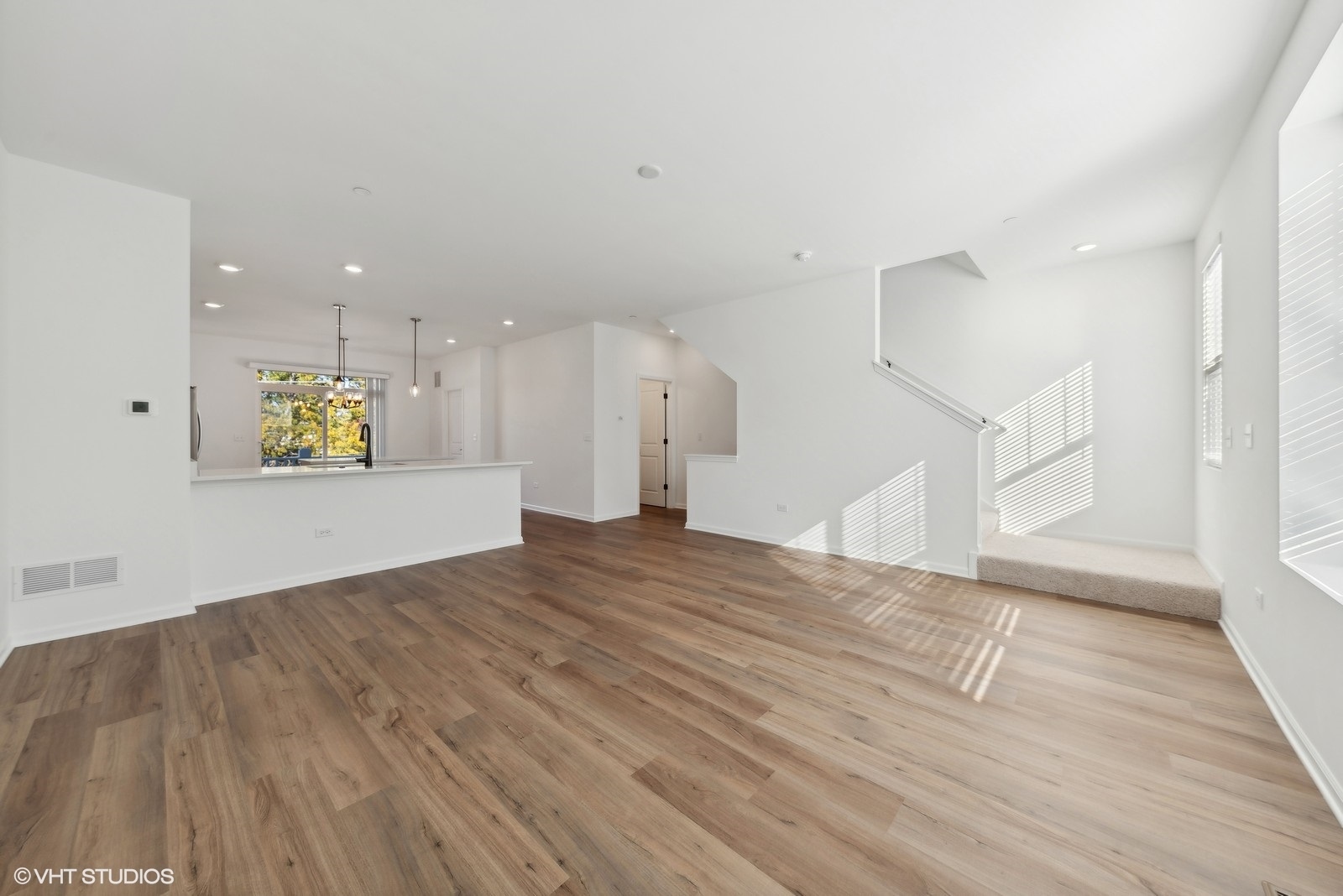 1033 Wren Road Des Plaines, IL 60018 - Photo 3 of 20 a view of empty room with wooden floor and window