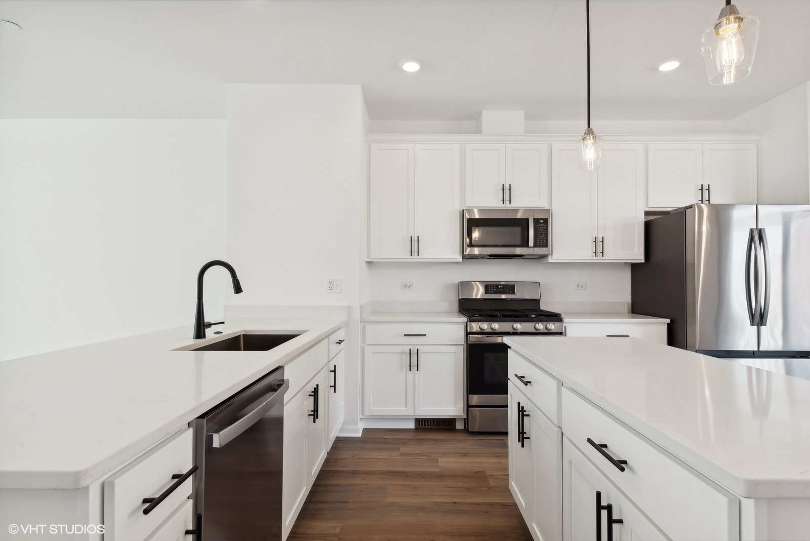1033 Wren Road Des Plaines, IL 60018 - Photo 6 of 20 a kitchen with a sink a stove and refrigerator