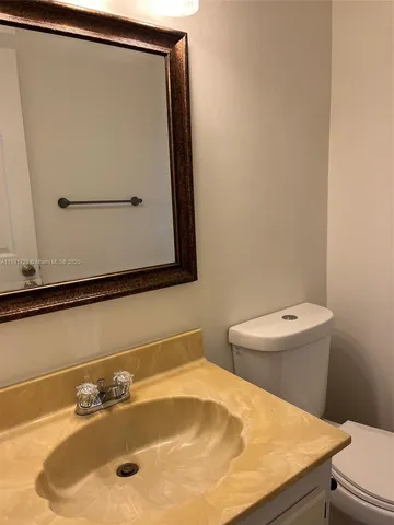 a bathroom with a sink and a toilet