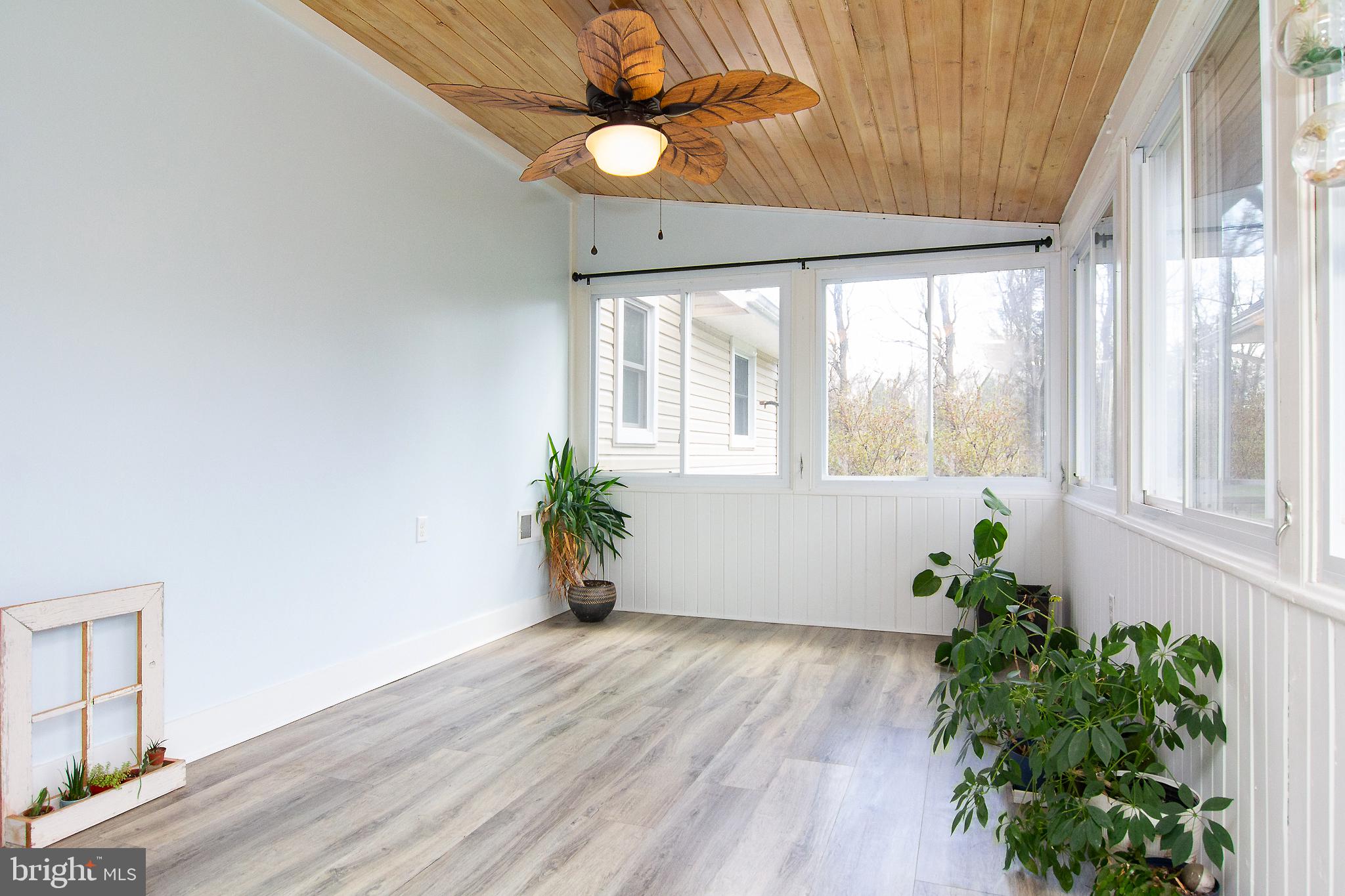 3061 Emmitsburg Road Gettysburg, PA 17325 - Photo 14 of 47 a view of an empty room with a window and wooden floor