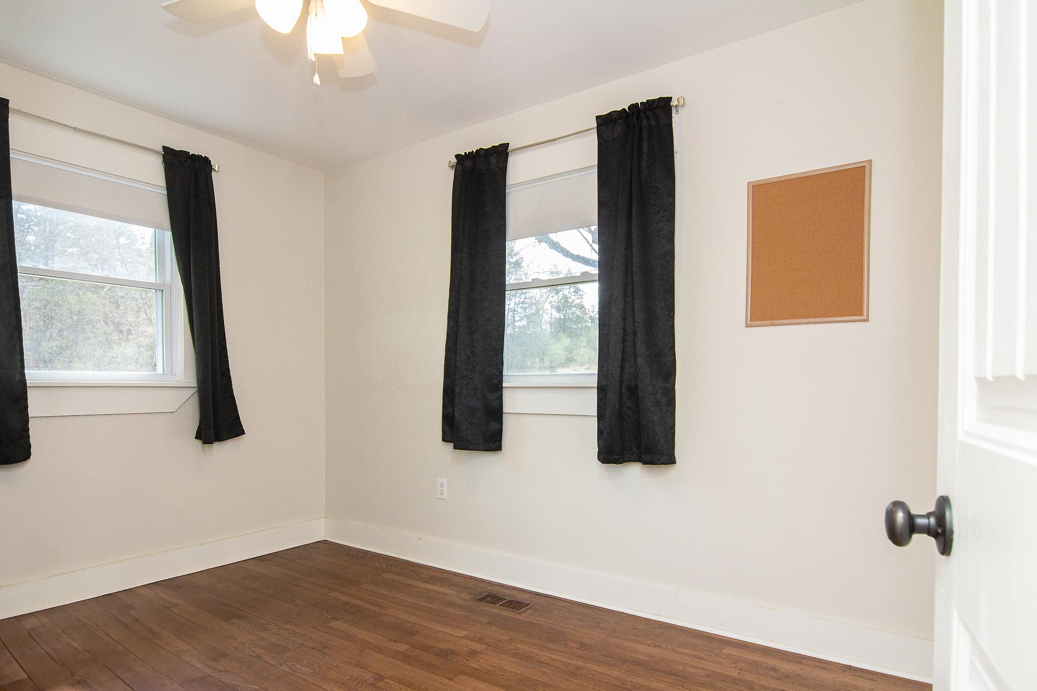 3061 Emmitsburg Road Gettysburg, PA 17325 - Photo 16 of 47 a view of a room with wooden floor and windows