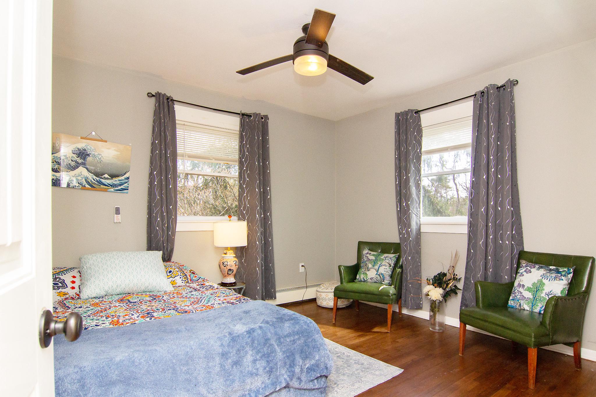 3061 Emmitsburg Road Gettysburg, PA 17325 - Photo 17 of 47 a bedroom with a bed and wooden floor