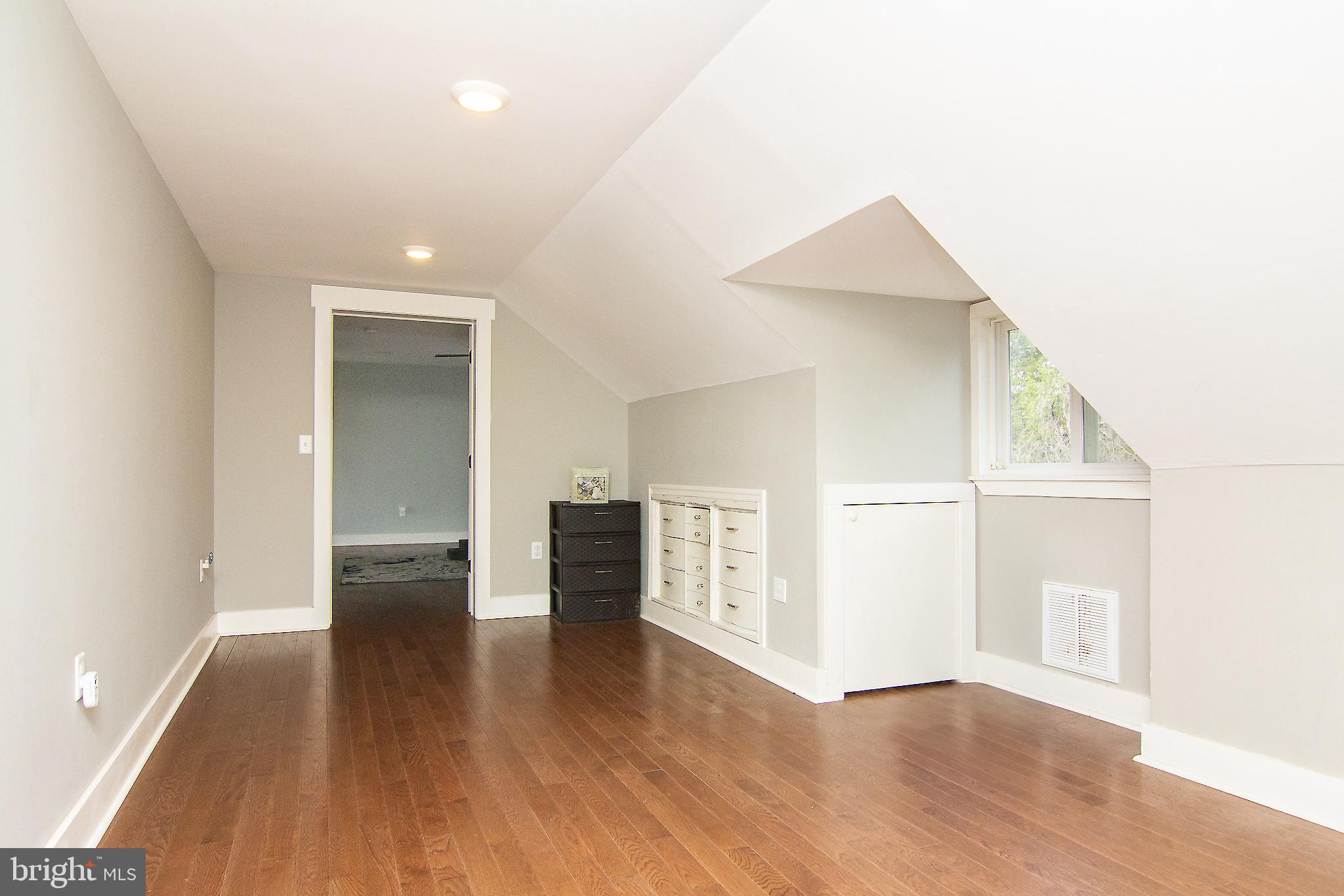 3061 Emmitsburg Road Gettysburg, PA 17325 - Photo 19 of 47 wooden floor in an empty room with a window