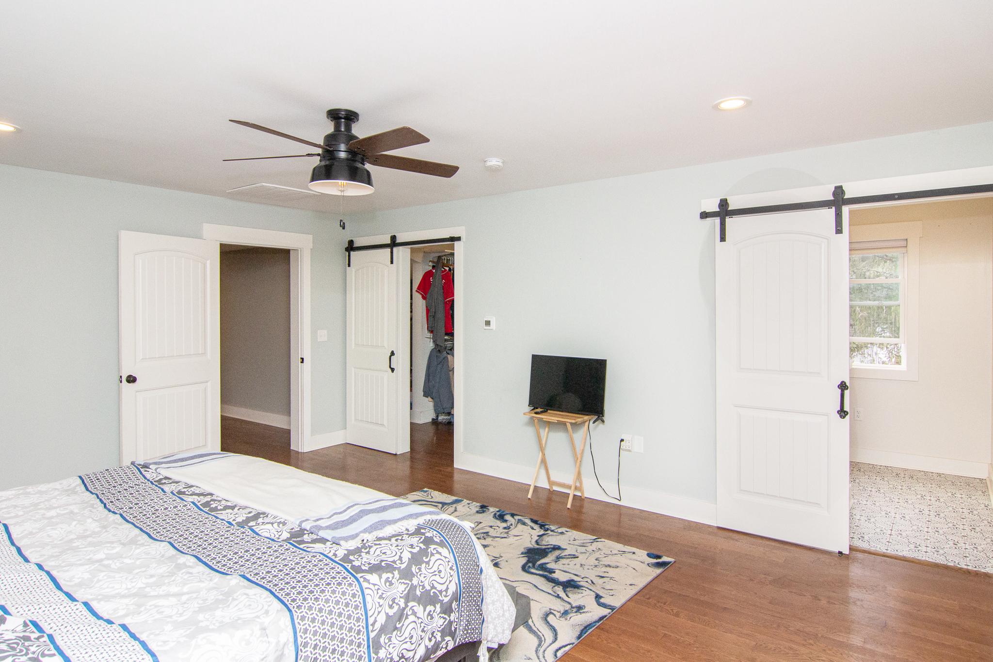 3061 Emmitsburg Road Gettysburg, PA 17325 - Photo 23 of 47 a bedroom with a bed and a flat screen tv