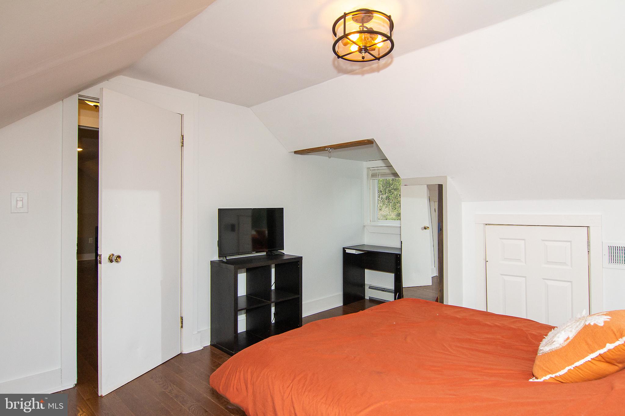 3061 Emmitsburg Road Gettysburg, PA 17325 - Photo 26 of 47 a bed room with a bed and a television