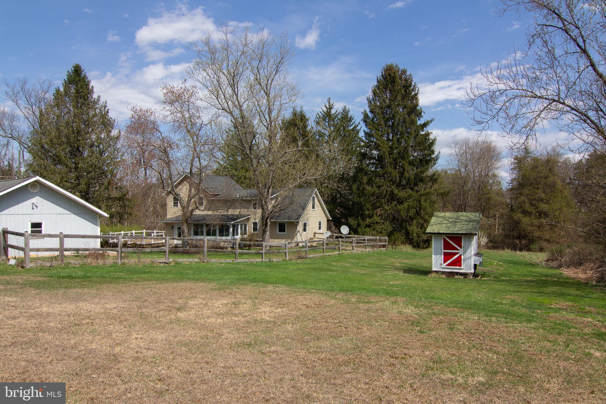 3061 Emmitsburg Road Gettysburg, PA 17325 - Photo 38 of 47 a front view of a house with a yard and trees