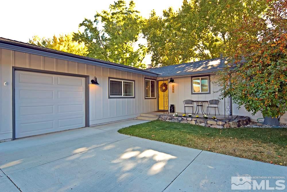 2390 Riviera Street Reno, NV 89509 - Photo 1 of 19 a view of a house with a backyard