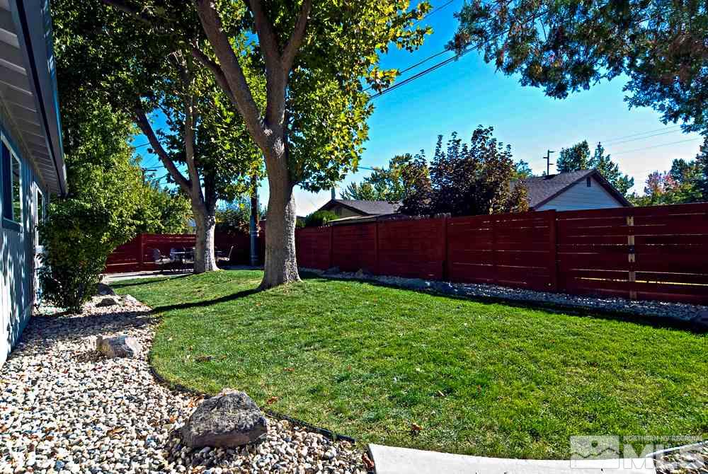 2390 Riviera Street Reno, NV 89509 - Photo 16 of 19 a view of a backyard with wooden fence