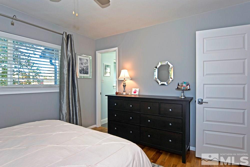 2390 Riviera Street Reno, NV 89509 - Photo 9 of 19 a bedroom with a bed and a dresser