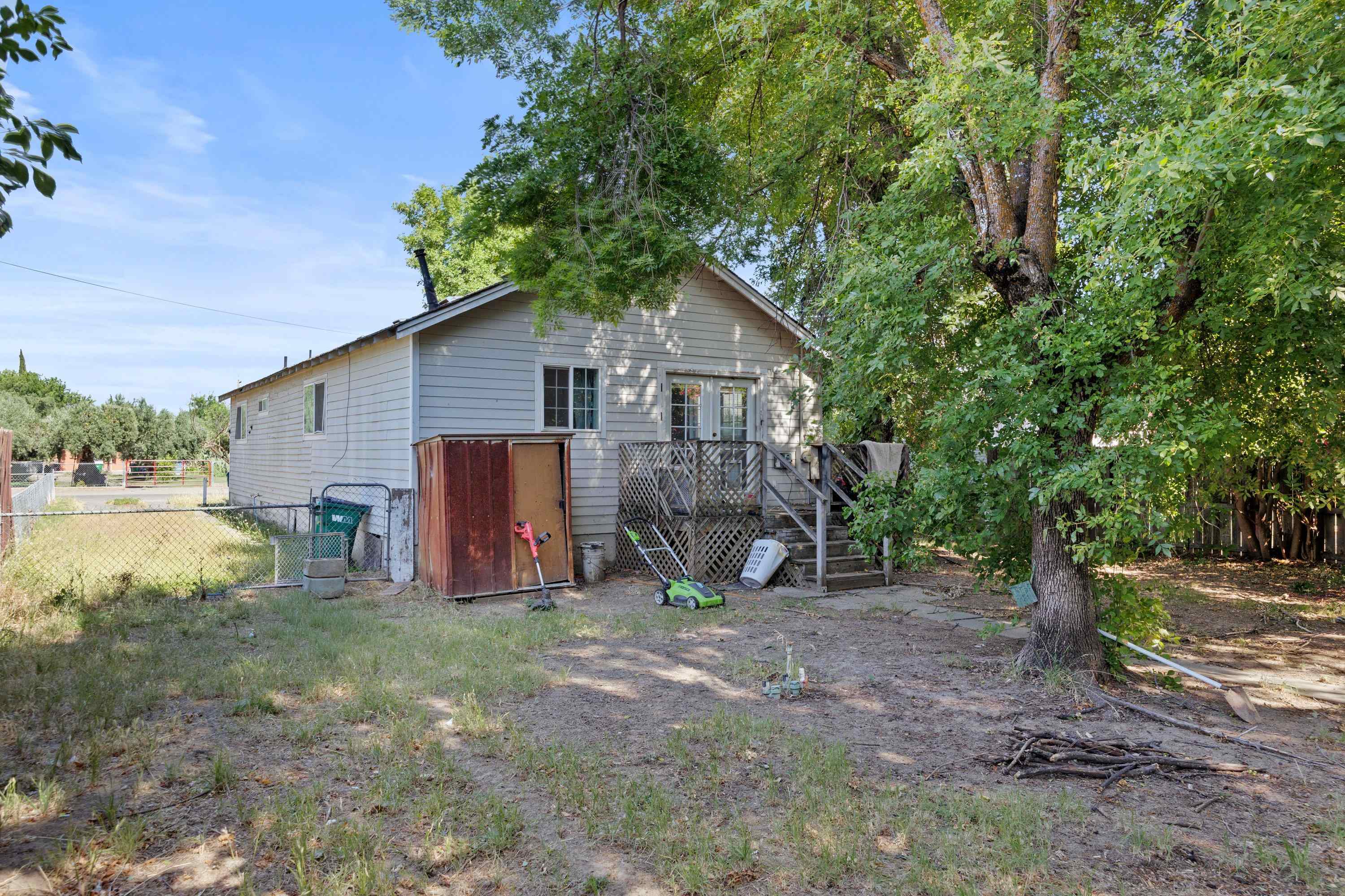 1220 5th Avenue Corning, CA 96021 - Photo 13 of 15 a view of a house with backyard and sitting area