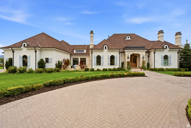 71 Farm Road Midway, UT 84049 - Photo 3 of 92 Stately exterior with a stucco finish, stone accents, and a brown tile roof
