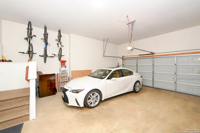 a car parked in a room next to a window