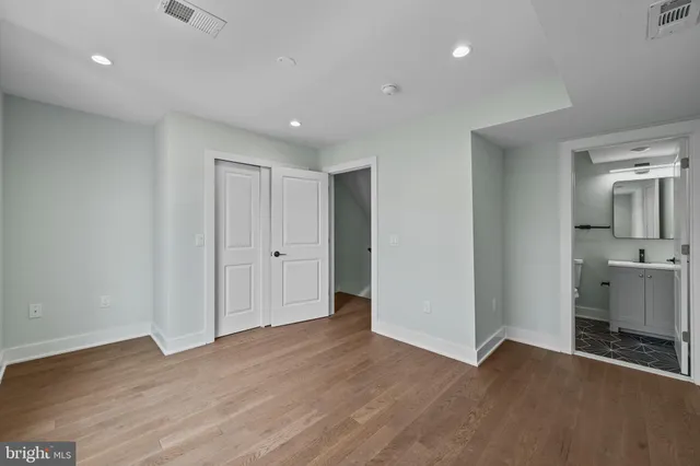 a view of a livingroom with a kitchen