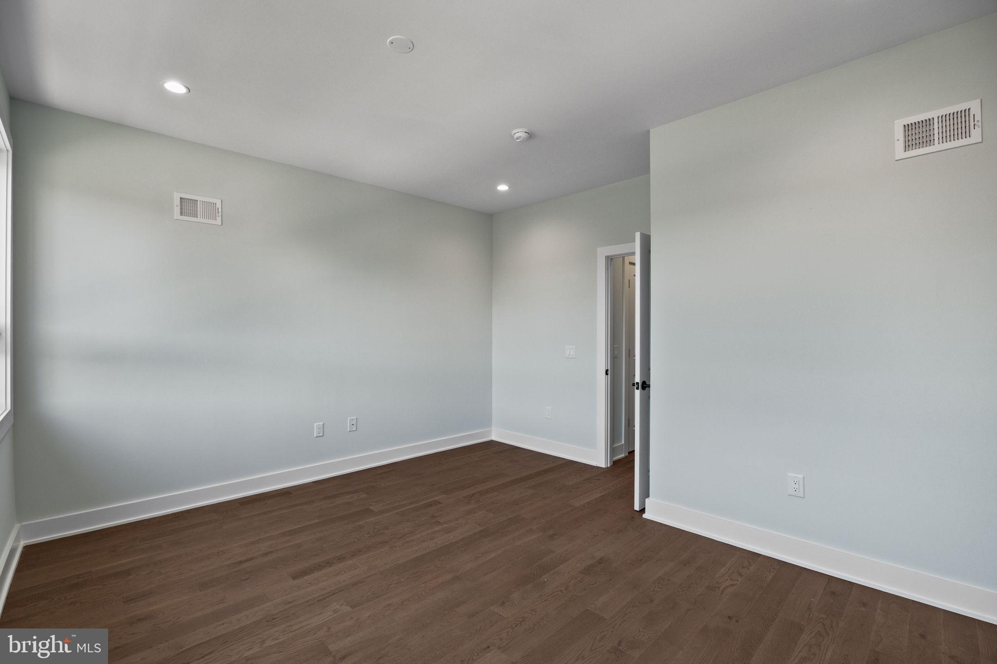 2202 East Huntingdon Street Philadelphia, PA 19125 - Photo 23 of 42 wooden floor in an empty room