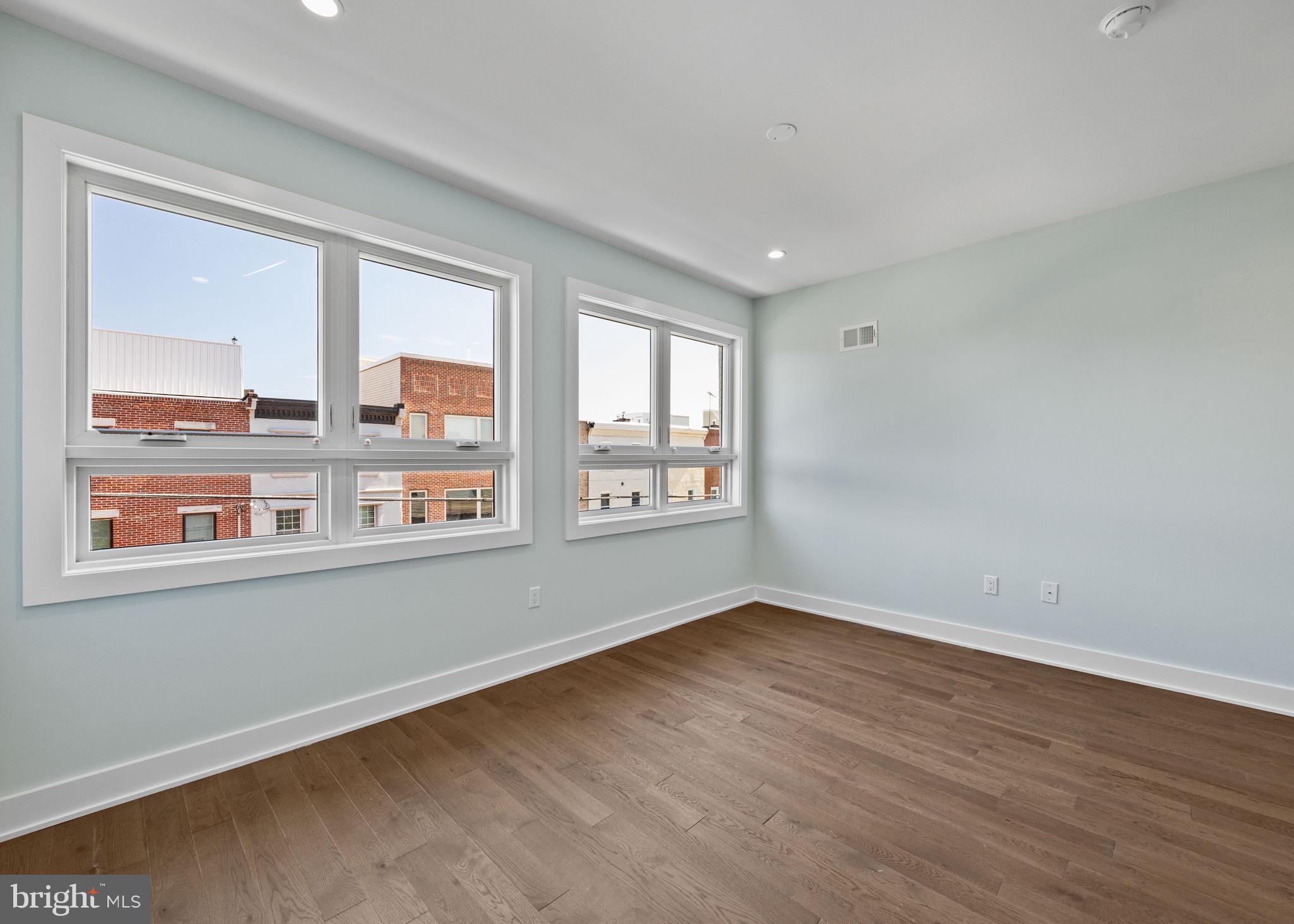 2202 East Huntingdon Street Philadelphia, PA 19125 - Photo 24 of 42 a view of an empty room with a window