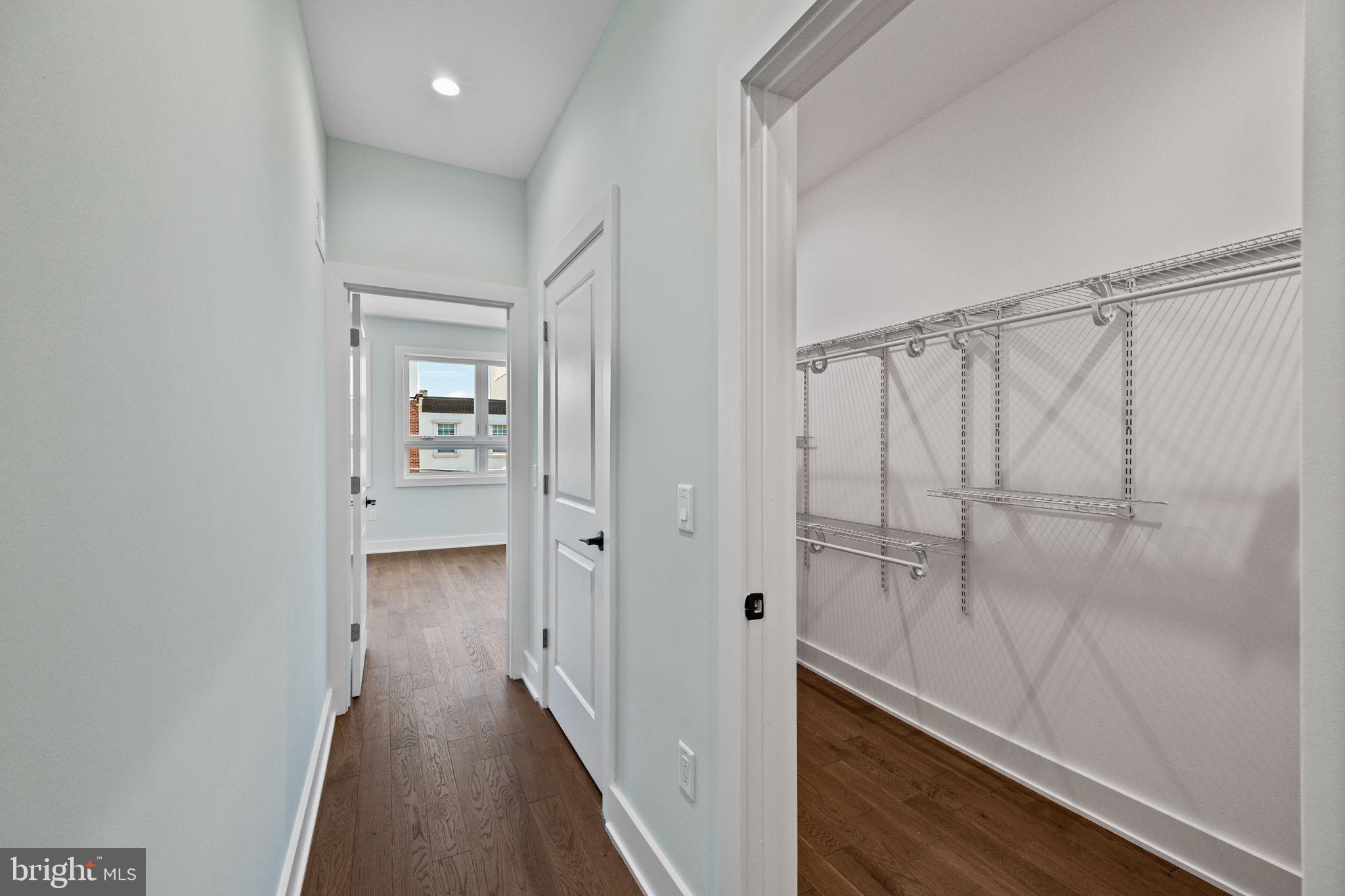 2202 East Huntingdon Street Philadelphia, PA 19125 - Photo 26 of 42 a view of a hallway with wooden floor