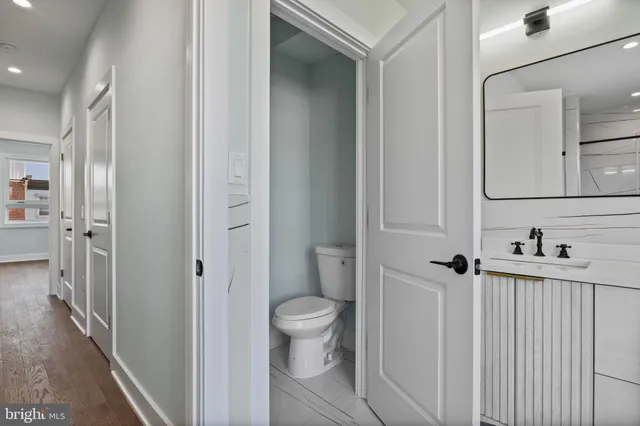 a bathroom with a sink and a toilet