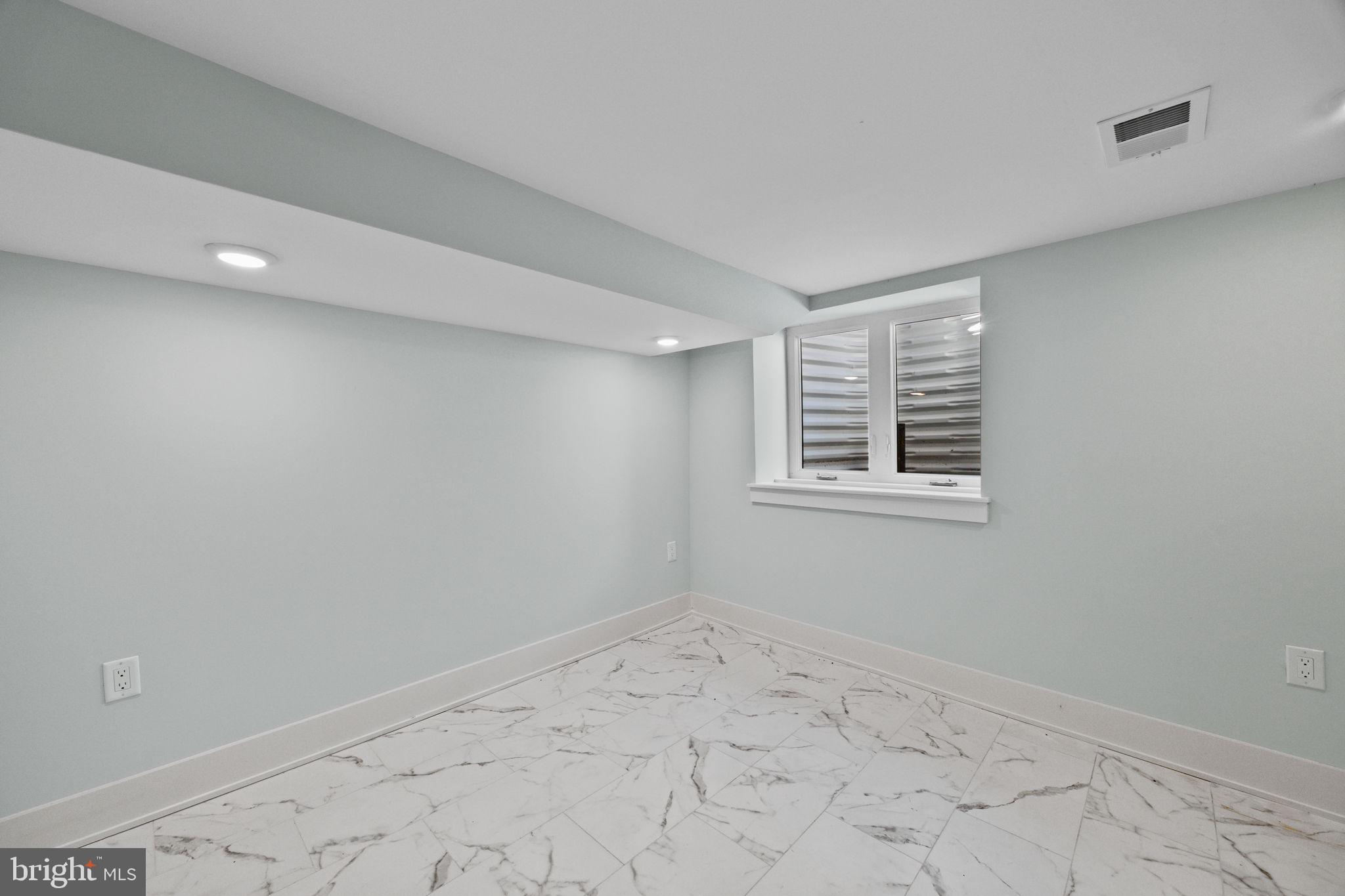 2202 East Huntingdon Street Philadelphia, PA 19125 - Photo 34 of 42 a view of empty room with window