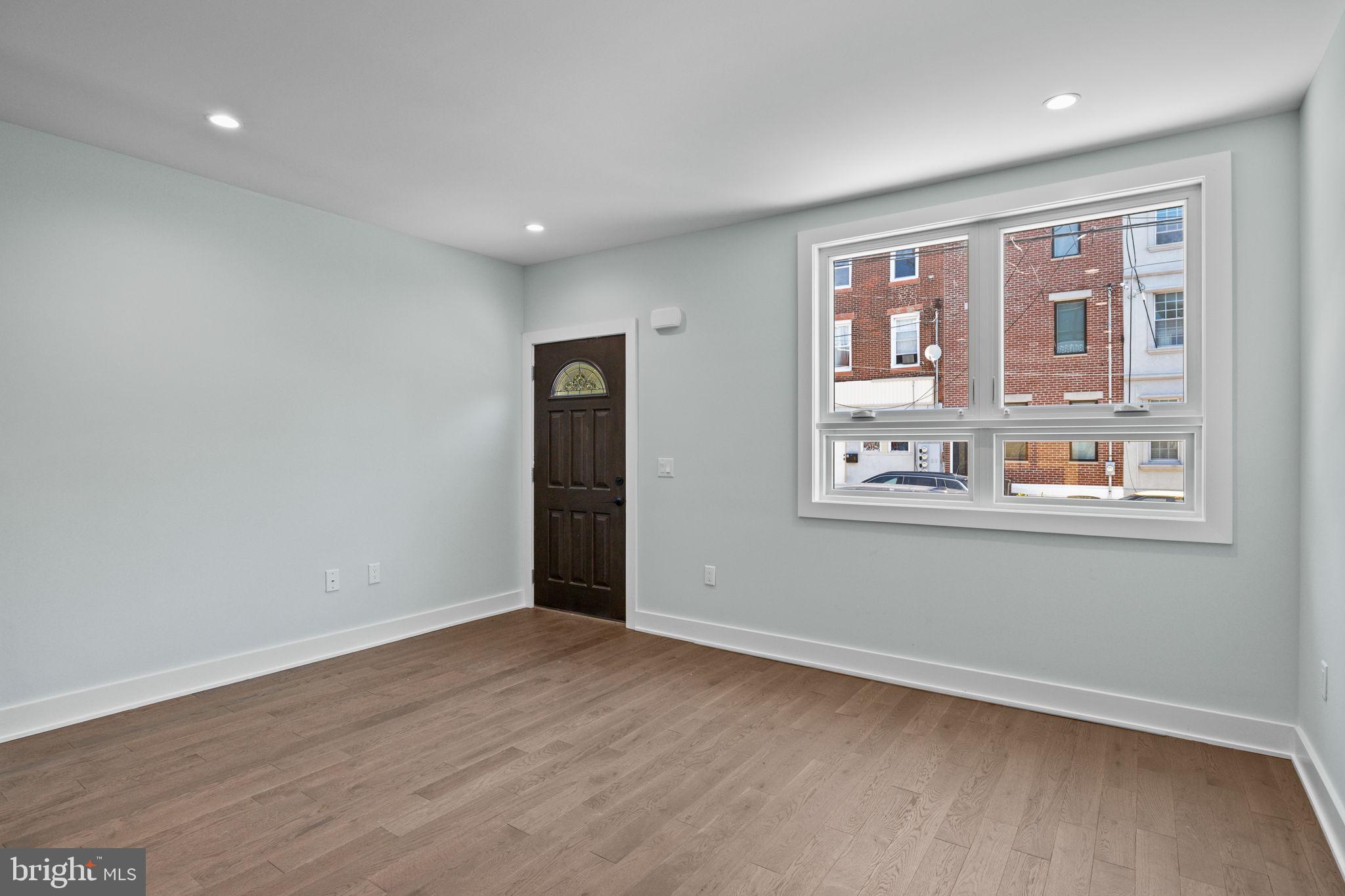 2202 East Huntingdon Street Philadelphia, PA 19125 - Photo 4 of 42 a view of an empty room with a window