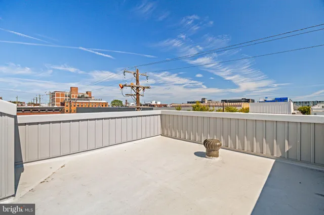 a view of balcony with furniture