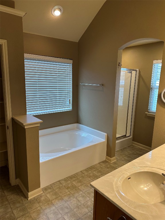 7518 Amber Meadow Loop Temple, TX 76502 - Photo 14 of 35 a bathroom with a granite countertop sink and a bathtub