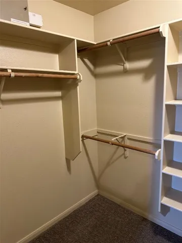 a bathroom with a sink a vanity and a mirror