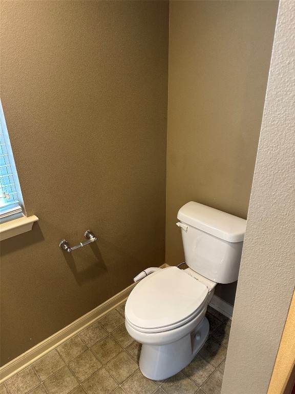 7518 Amber Meadow Loop Temple, TX 76502 - Photo 18 of 35 a white toilet sitting next to a shower