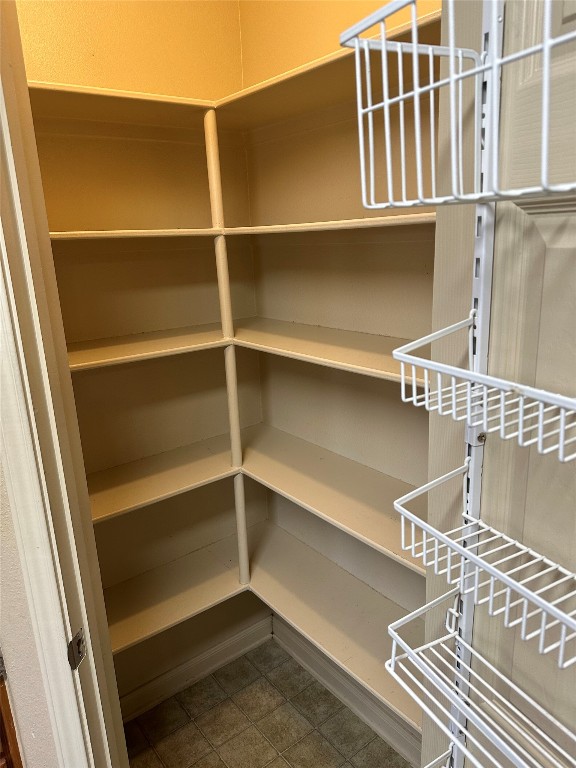 7518 Amber Meadow Loop Temple, TX 76502 - Photo 23 of 35 a view of walk in closet with empty racks