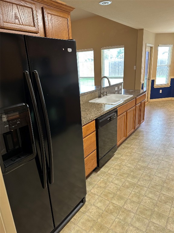 7518 Amber Meadow Loop Temple, TX 76502 - Photo 26 of 35 a kitchen with stainless steel appliances granite countertop a refrigerator a sink a stove and island