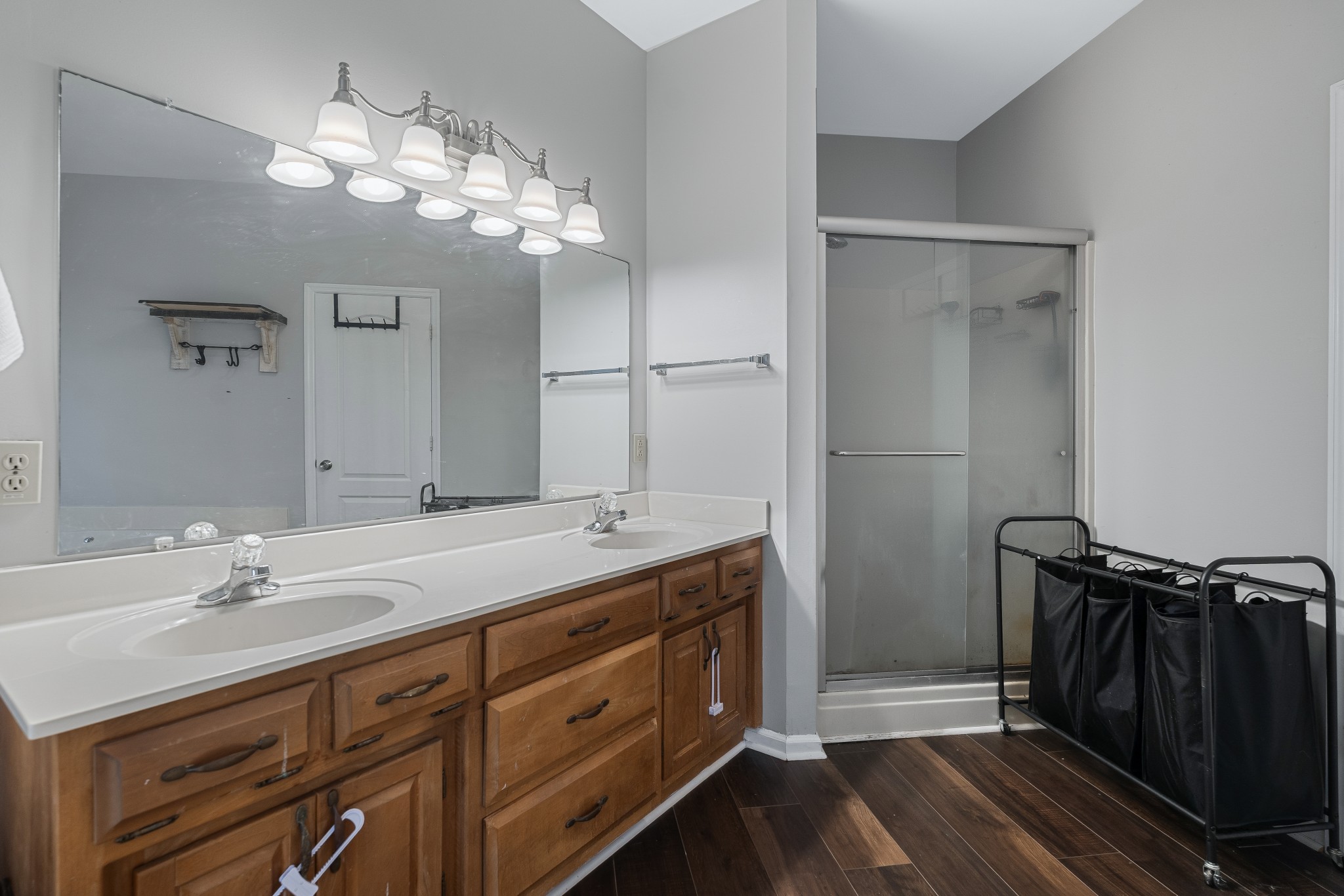 79 Hunt Creek Road Manchester, TN 37355 - Photo 20 of 28 a spacious bathroom with a double vanity sink a mirror and a shower
