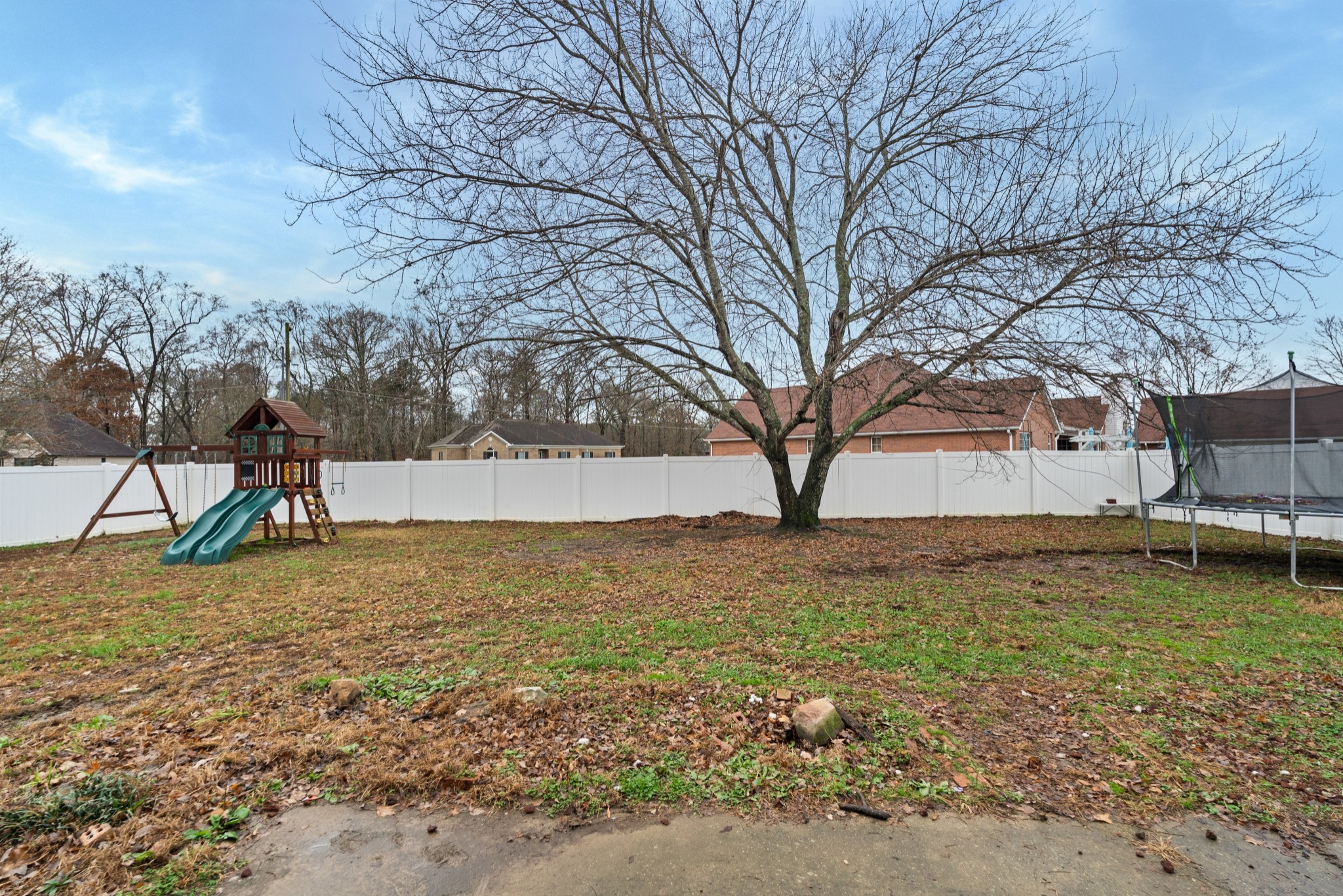 79 Hunt Creek Road Manchester, TN 37355 - Photo 25 of 28 a backyard of a house with lots of green space