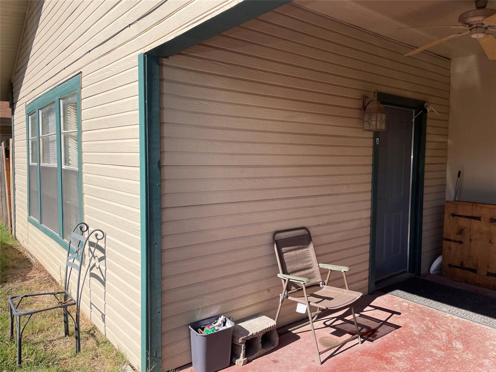 2130 South 2nd Street, Unit B Abilene, TX 79605 - Photo 2 of 12 a view of a patio with chair and tables