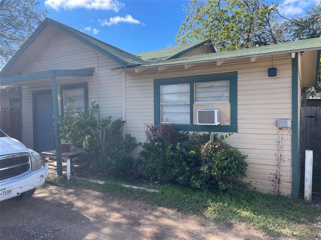 2130 South 2nd Street, Unit B Abilene, TX 79605 - Photo 5 of 12 a view of a house with a yard