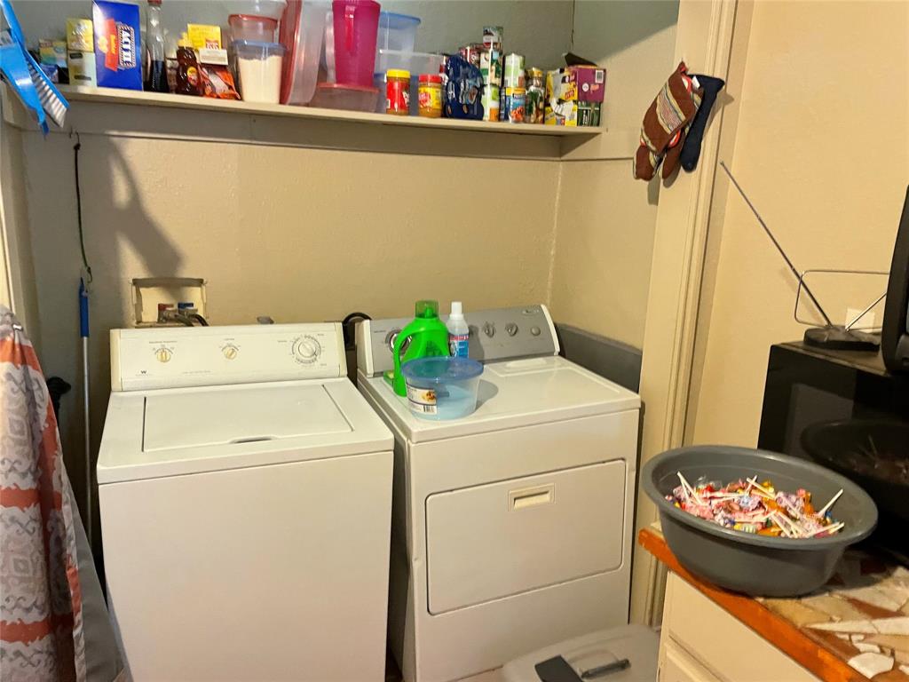 2130 South 2nd Street, Unit B Abilene, TX 79605 - Photo 9 of 12 a utility room with dryer and washer