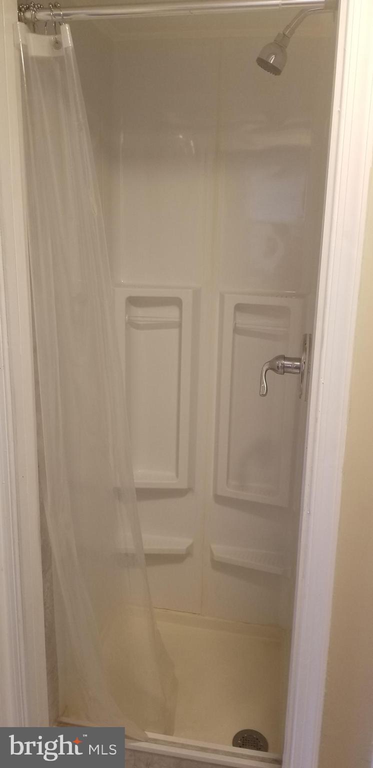 6818 Campfield Road Baltimore, MD 21207 - Photo 14 of 49 Shower in Main Floor Bathroom