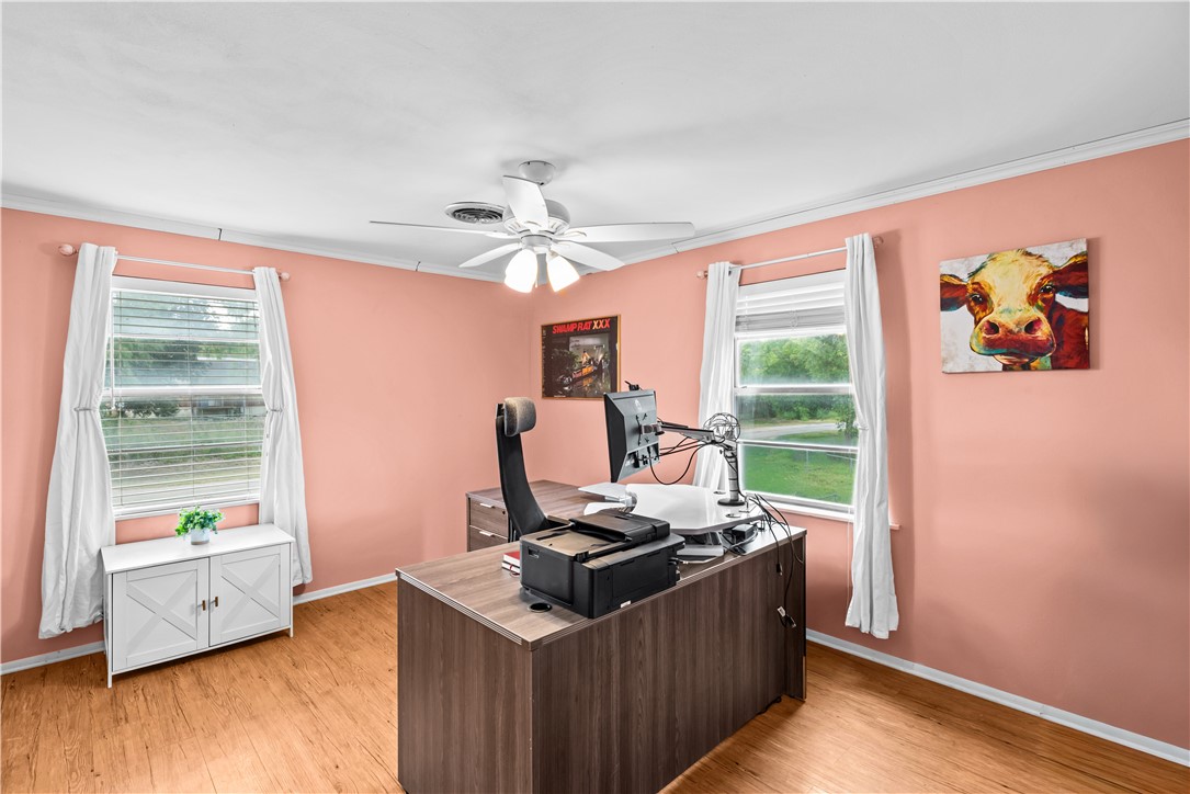 9505 County Road 505 Mathis, TX 78368 - Photo 16 of 19 a kitchen with stainless steel appliances granite countertop a stove and a view of living room