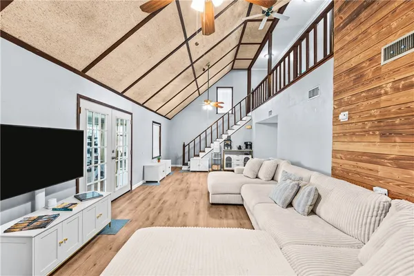 a house with swimming pool in front of it