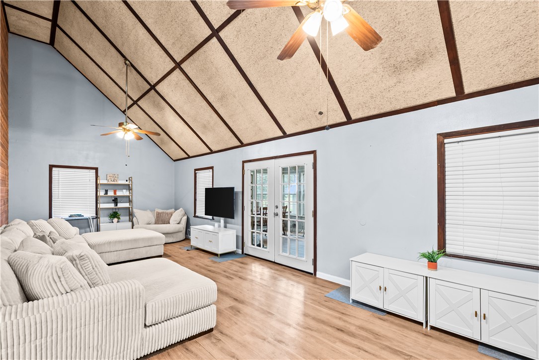 9505 County Road 505 Mathis, TX 78368 - Photo 5 of 19 a bedroom with furniture and wooden floor