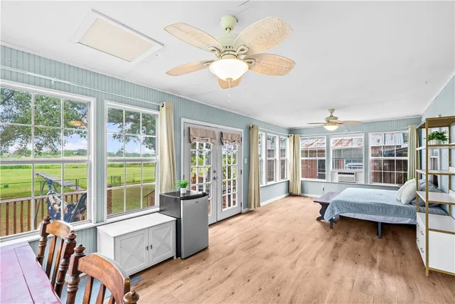 a kitchen with stainless steel appliances a refrigerator sink and cabinets
