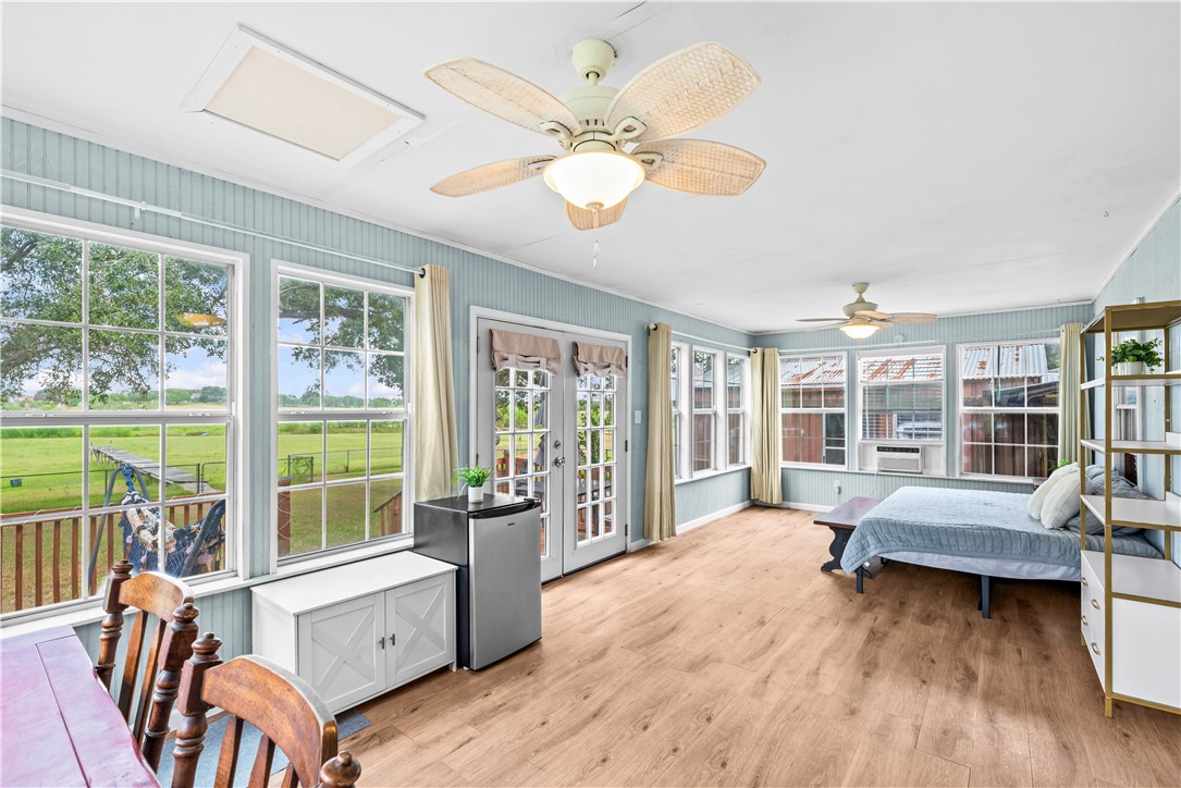 9505 County Road 505 Mathis, TX 78368 - Photo 7 of 19 a living room with furniture and a large window