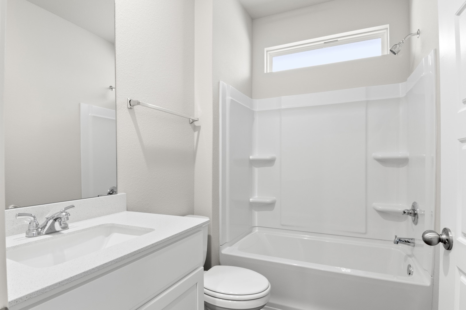 2963 Winding Creek Road Kyle, TX 78640 - Photo 24 of 28 a bathroom with a sink a toilet and a bathtub