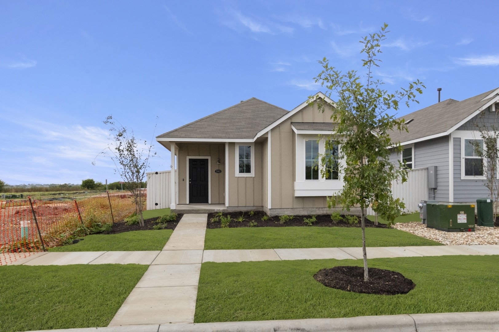 2963 Winding Creek Road Kyle, TX 78640 - Photo 4 of 28 a front view of a house with a yard