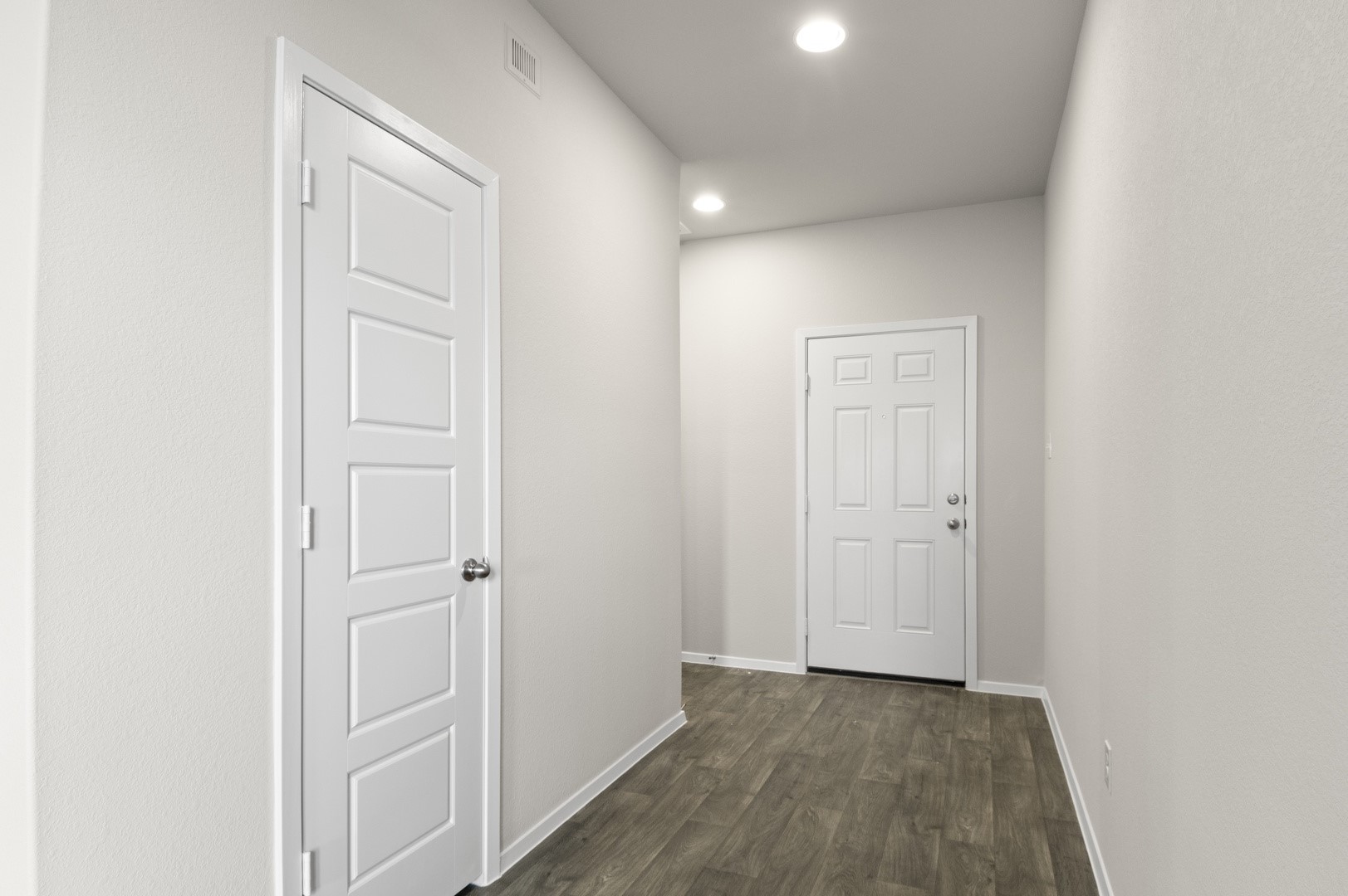 2963 Winding Creek Road Kyle, TX 78640 - Photo 6 of 28 a view of a hallway with wooden floor