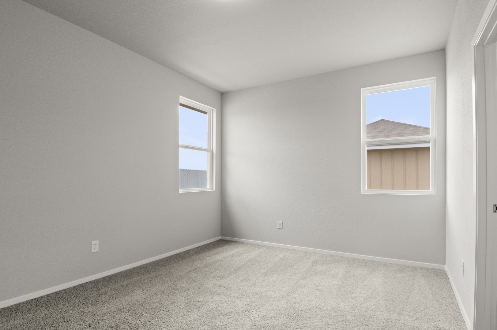 2963 Winding Creek Road Kyle, TX 78640 - Photo 10 of 28 an empty room with windows