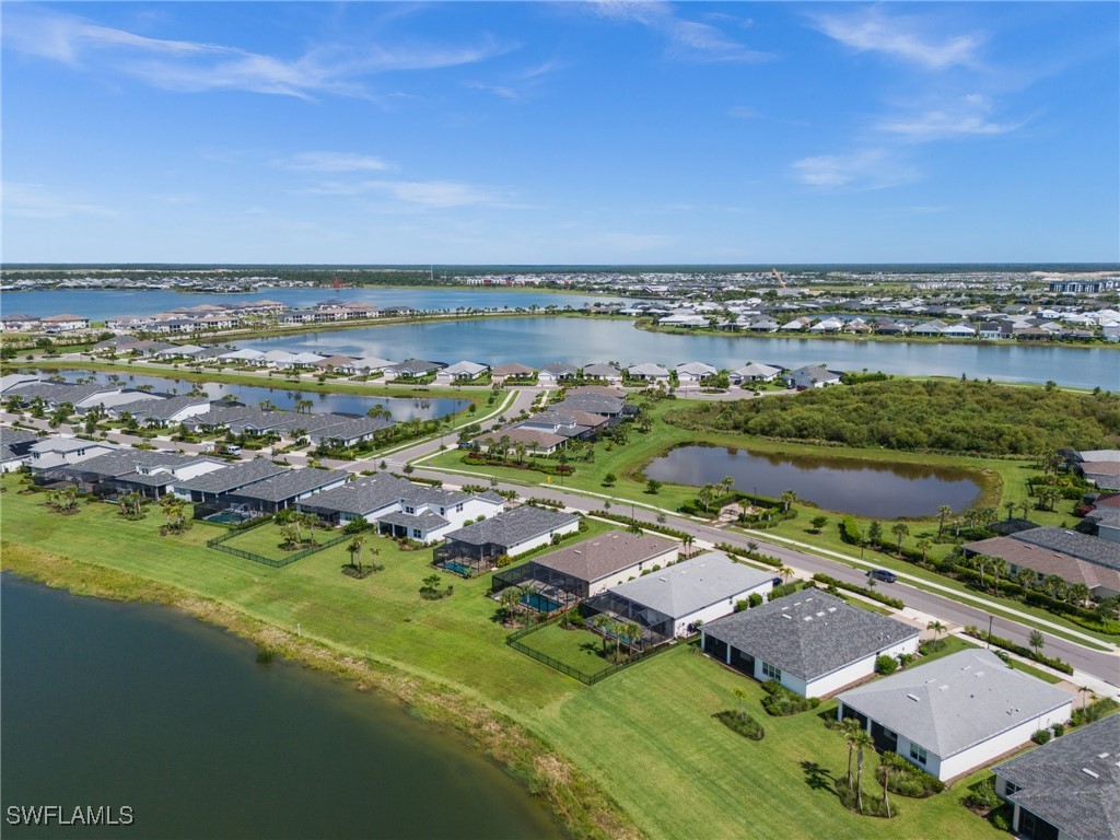 42243 Edgewater Drive Punta Gorda, FL 33982 - Photo 12 of 46 an aerial view of residential houses with outdoor space